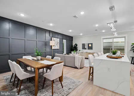 a view of kitchen with cabinets and wooden floor