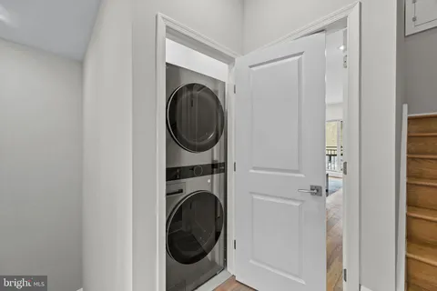 a view of a livingroom with furniture and a window