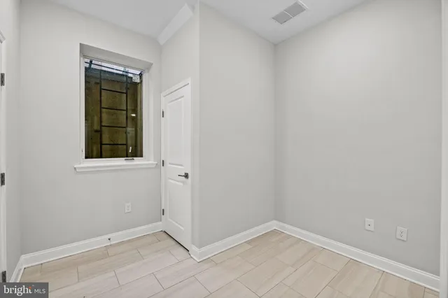wooden floor and closet in a room