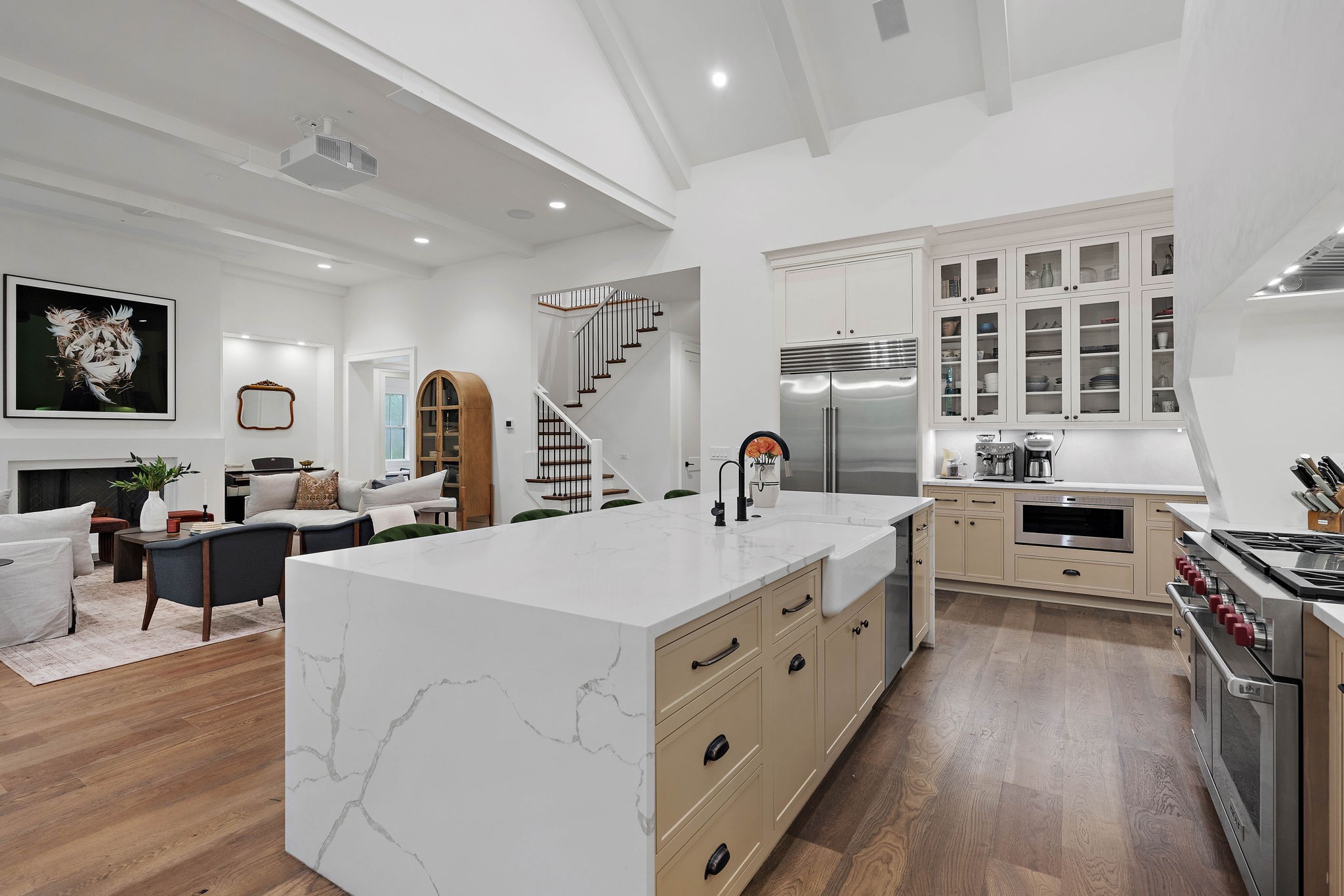 4340 Sneed Road Nashville, TN 37215 - Photo 12 of 49 a large white kitchen with cabinets a sink a window and stainless steel appliances