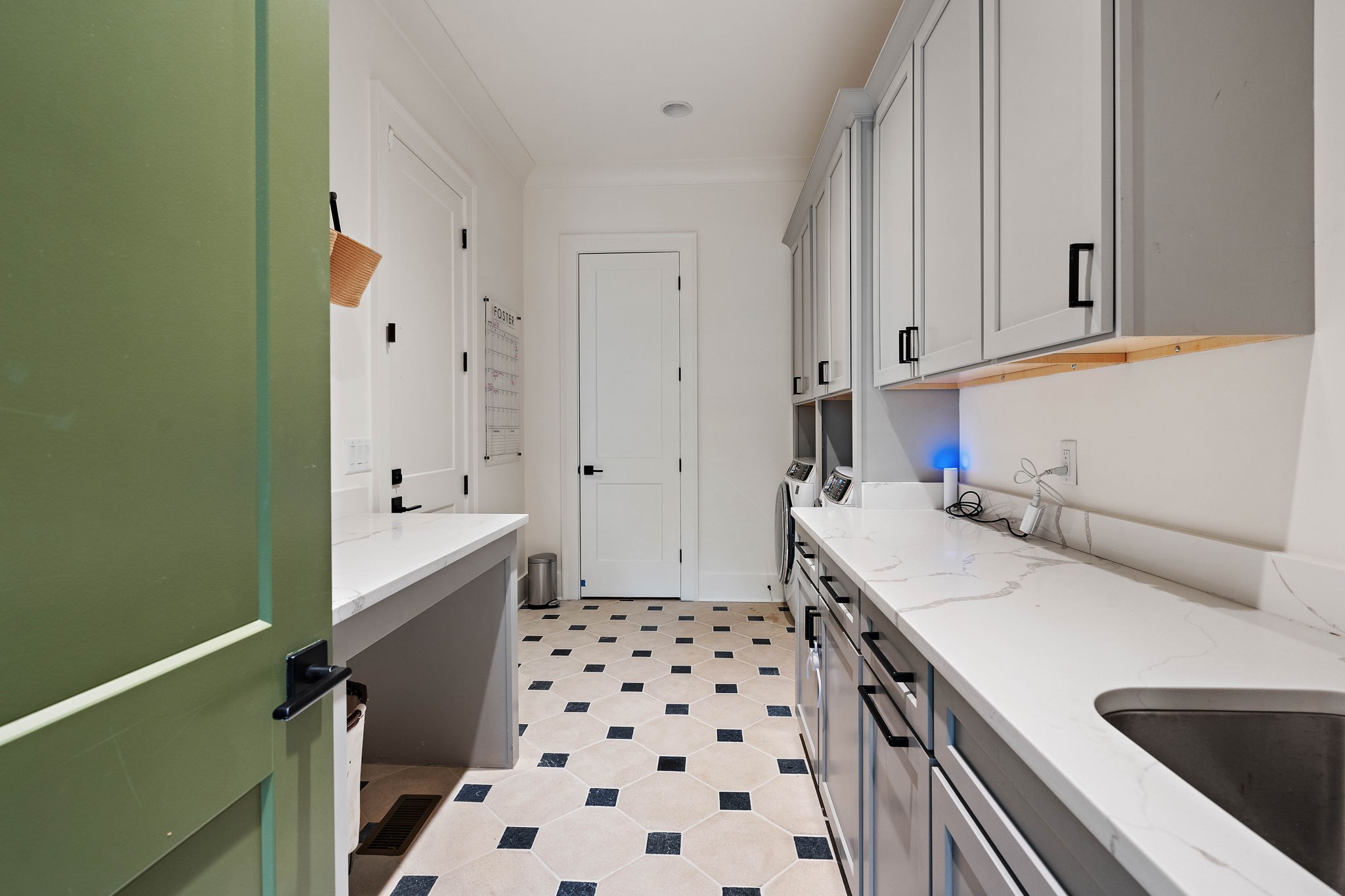 4340 Sneed Road Nashville, TN 37215 - Photo 16 of 49 a room with a sink and a refrigerator