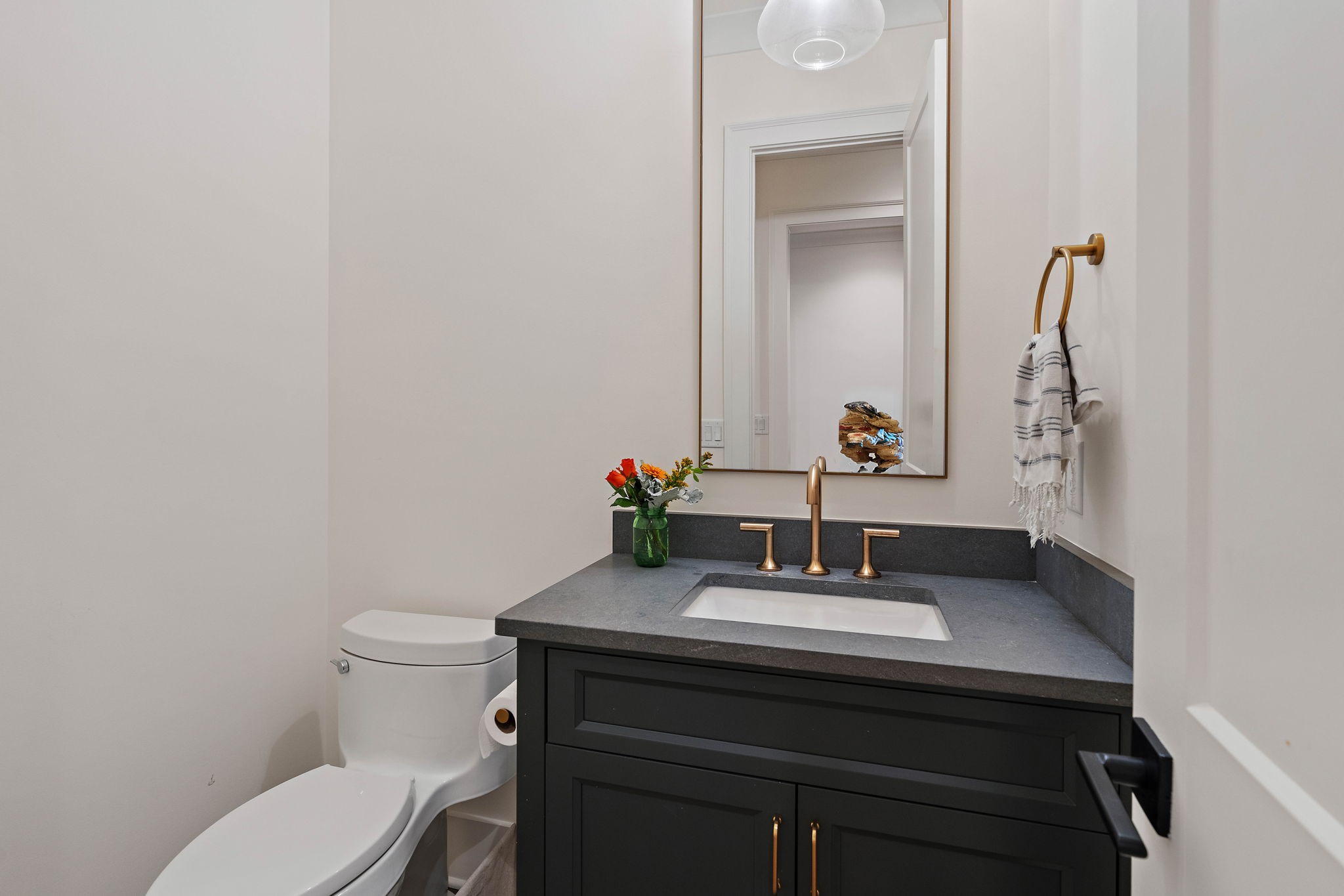 4340 Sneed Road Nashville, TN 37215 - Photo 20 of 49 a bathroom with a sink toilet and a mirror