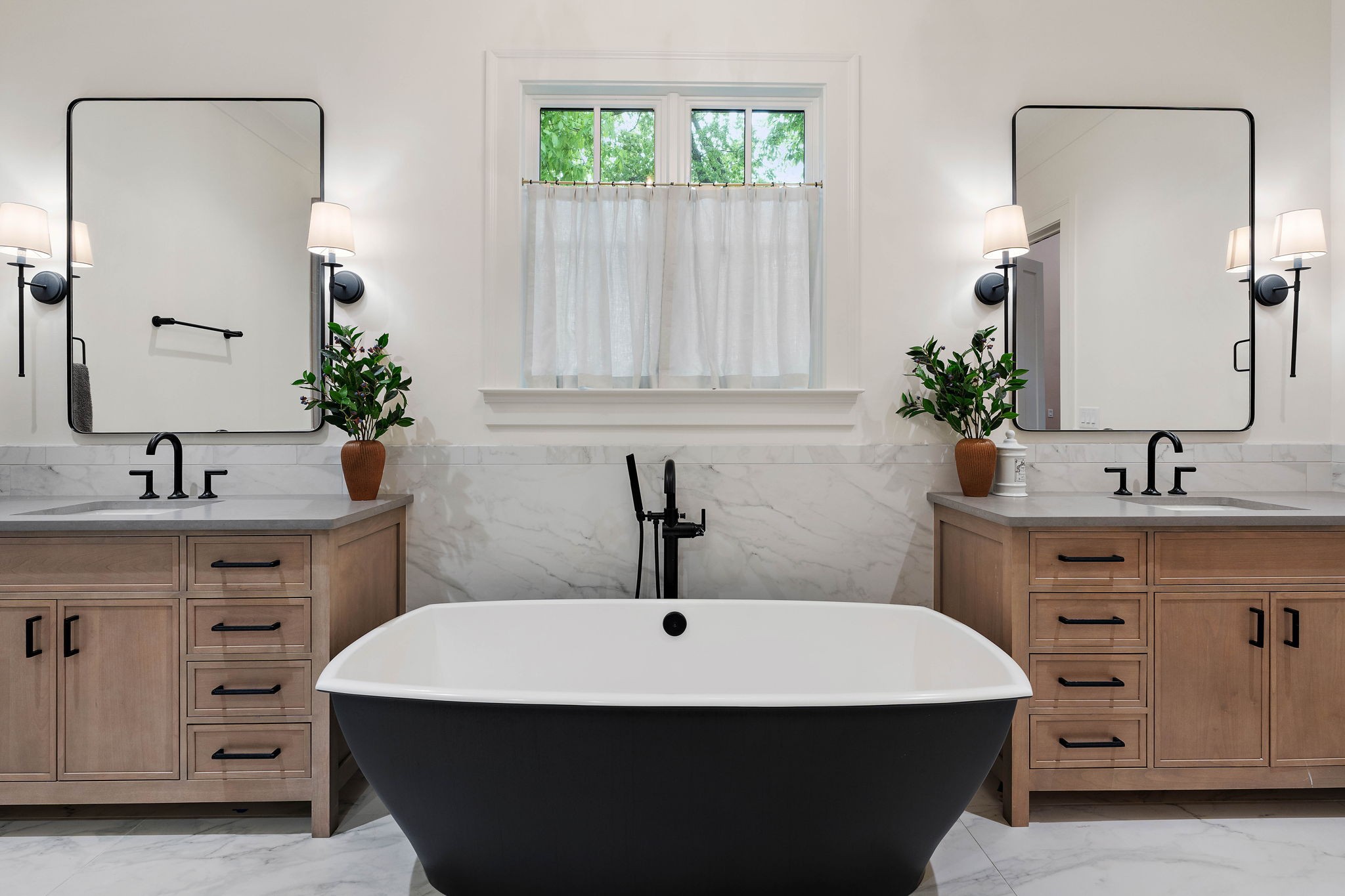 4340 Sneed Road Nashville, TN 37215 - Photo 25 of 49 a bathroom with a sink and a mirror