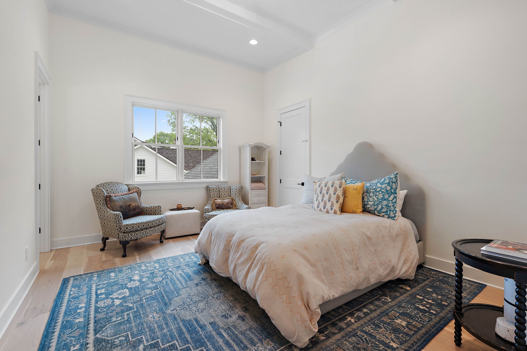 4340 Sneed Road Nashville, TN 37215 - Photo 28 of 49 a bedroom with a bed and wooden floor