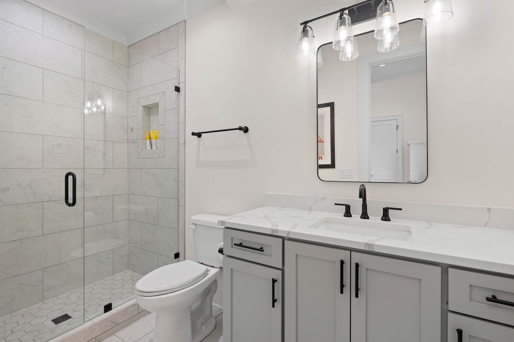 4340 Sneed Road Nashville, TN 37215 - Photo 30 of 49 a bathroom with a sink a toilet and shower