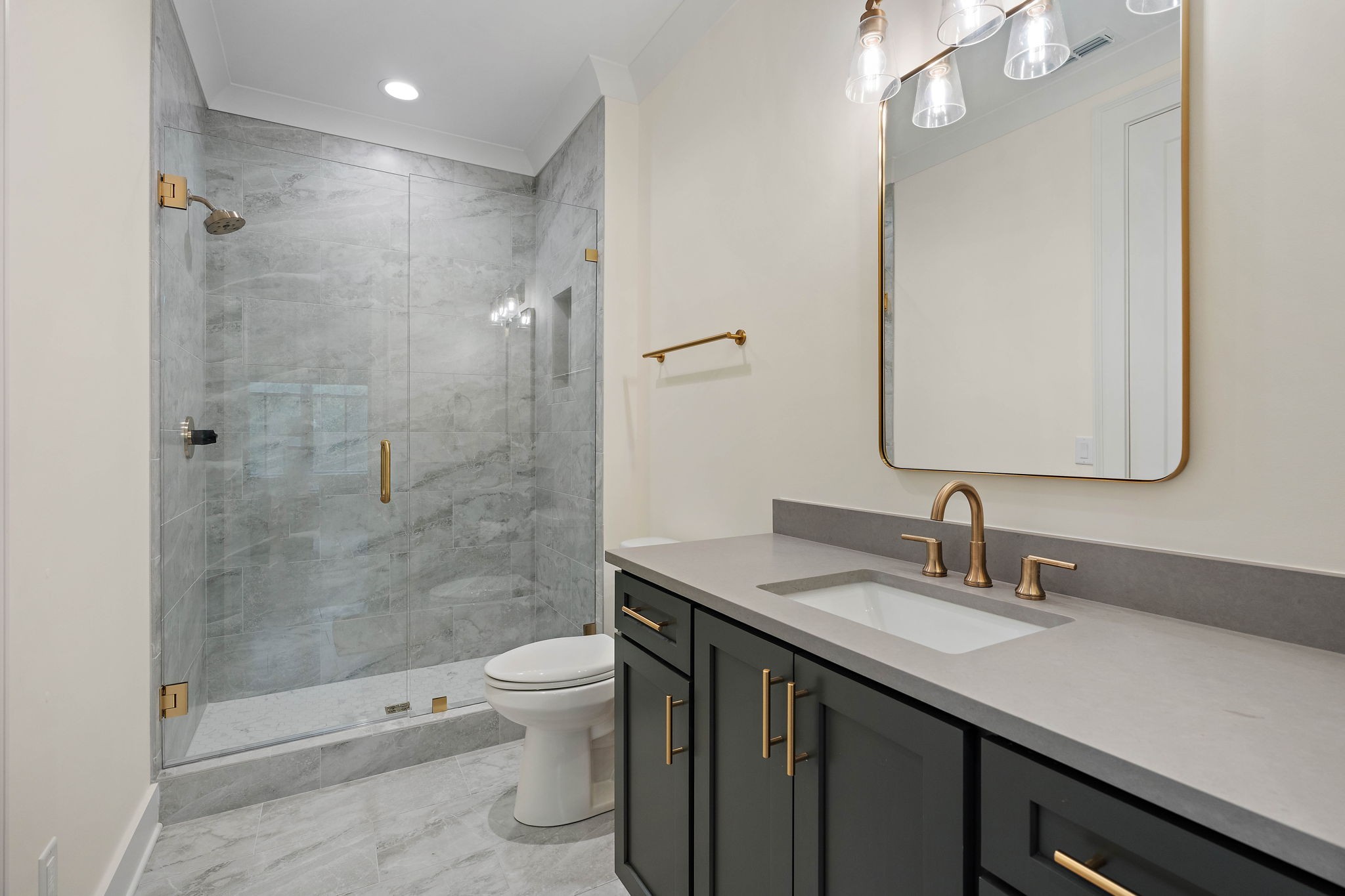 4340 Sneed Road Nashville, TN 37215 - Photo 33 of 49 a bathroom with a sink a toilet and shower