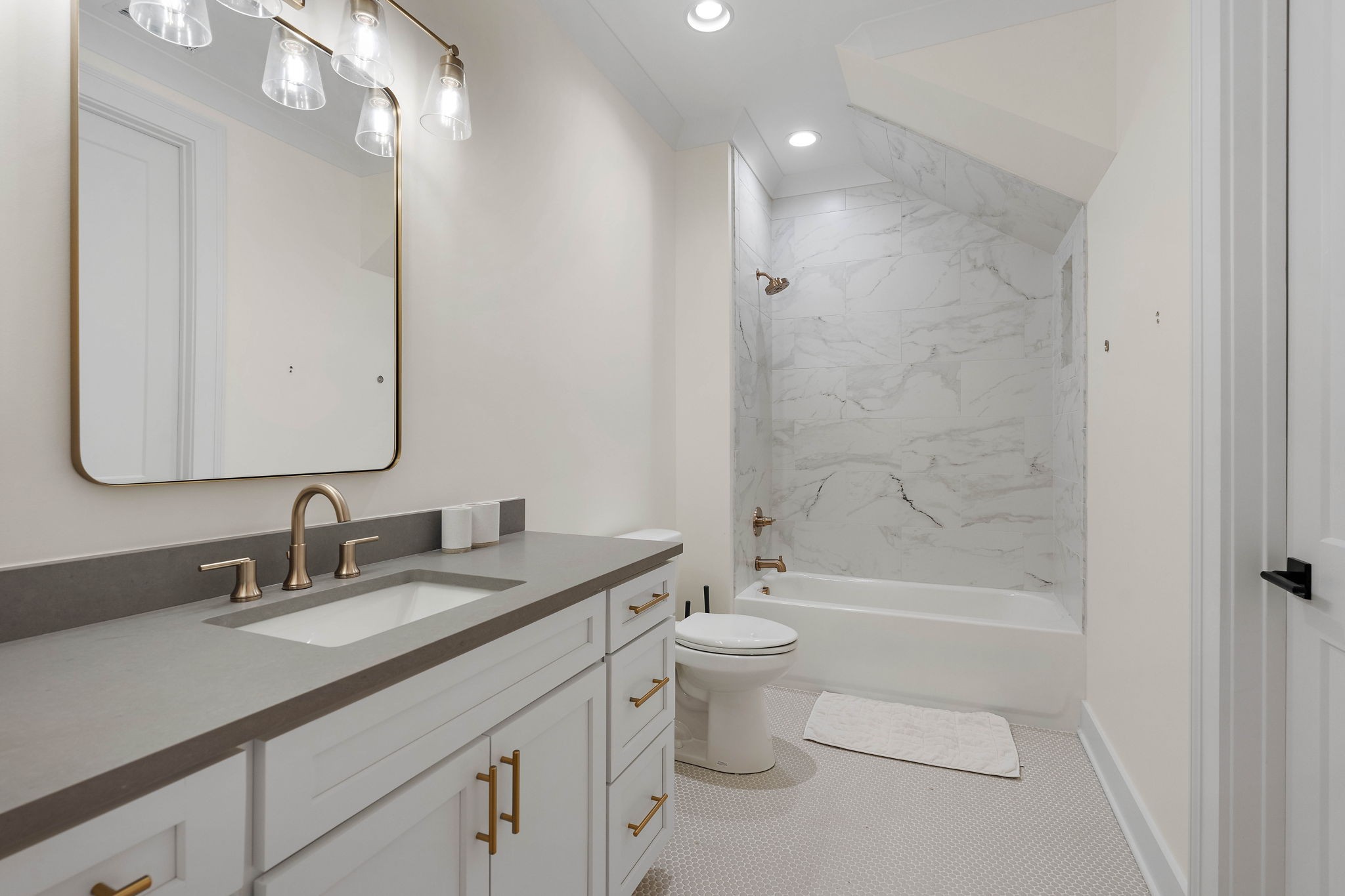 4340 Sneed Road Nashville, TN 37215 - Photo 36 of 49 a bathroom with a granite countertop sink a toilet and shower