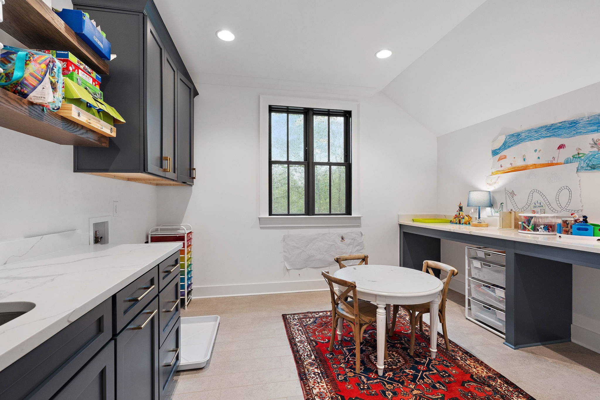 4340 Sneed Road Nashville, TN 37215 - Photo 39 of 49 a kitchen that has a table and chairs in it