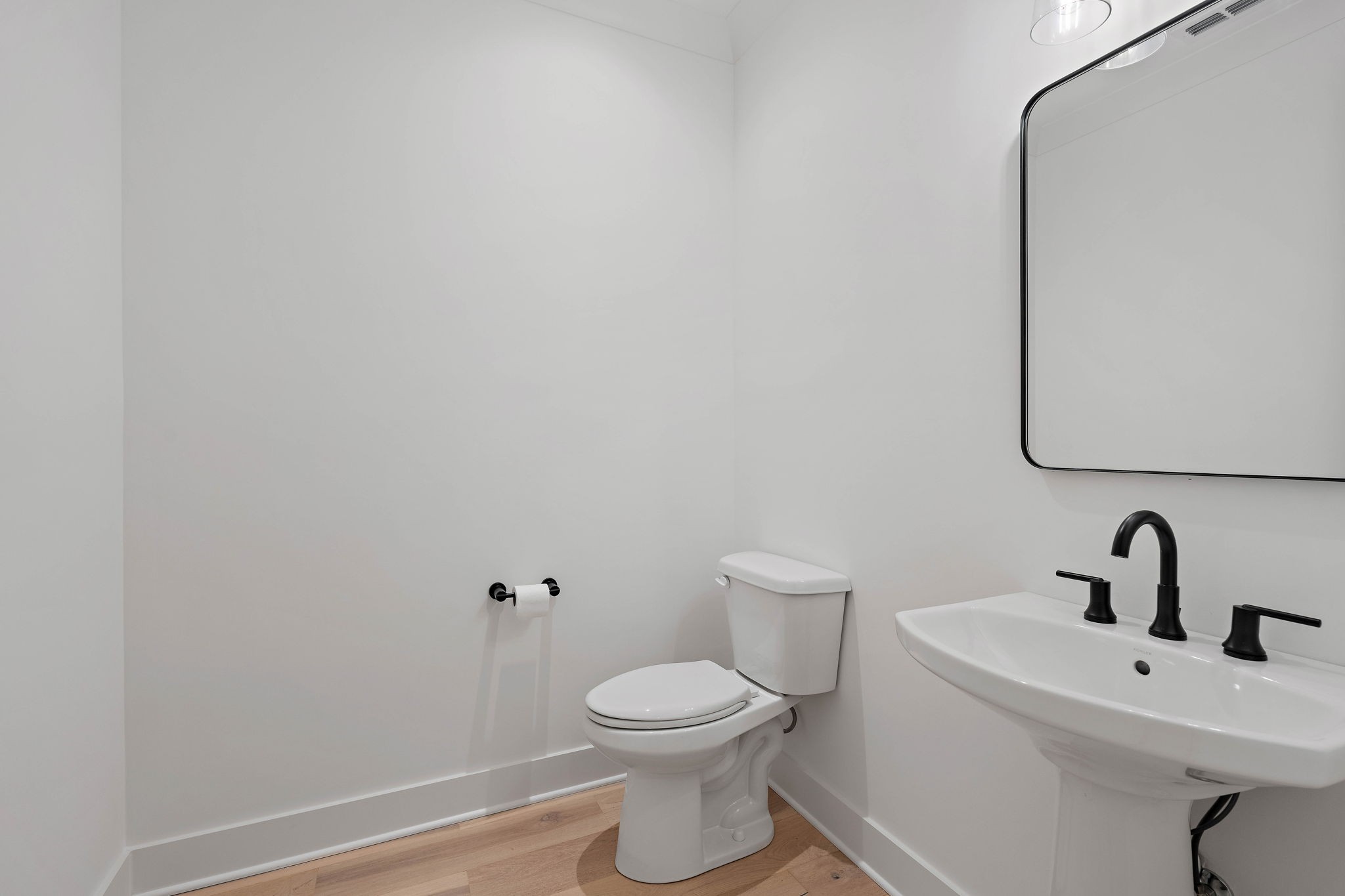 4340 Sneed Road Nashville, TN 37215 - Photo 40 of 49 a bathroom with a toilet a sink and mirror