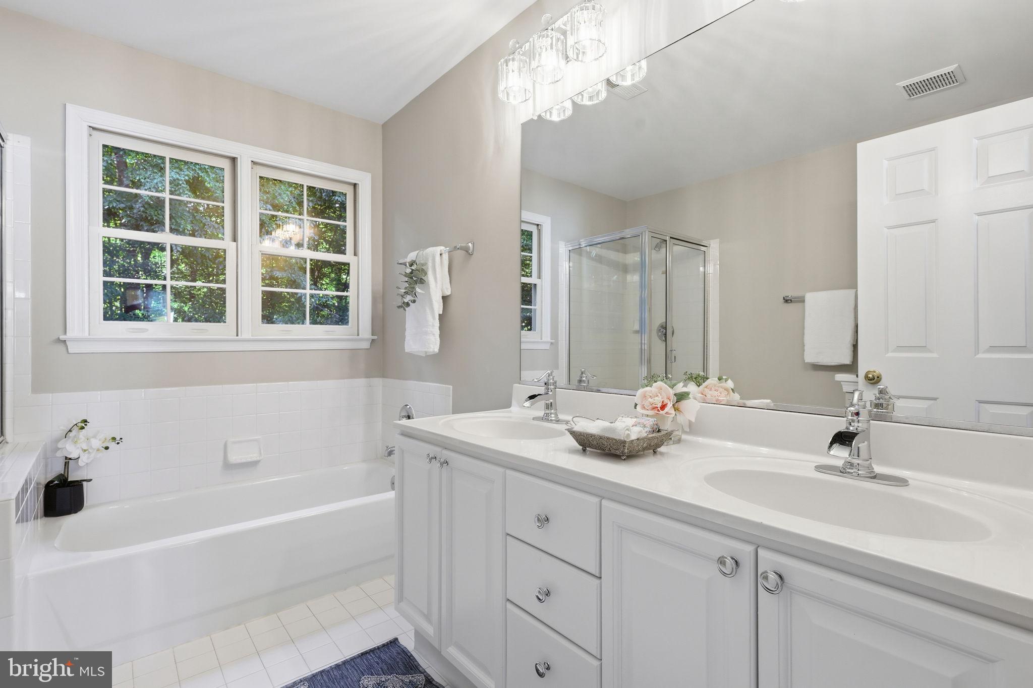 8556 Hooes Road Springfield, VA 22153 - Photo 31 of 57 Hall bath with separate shower and double vanity!