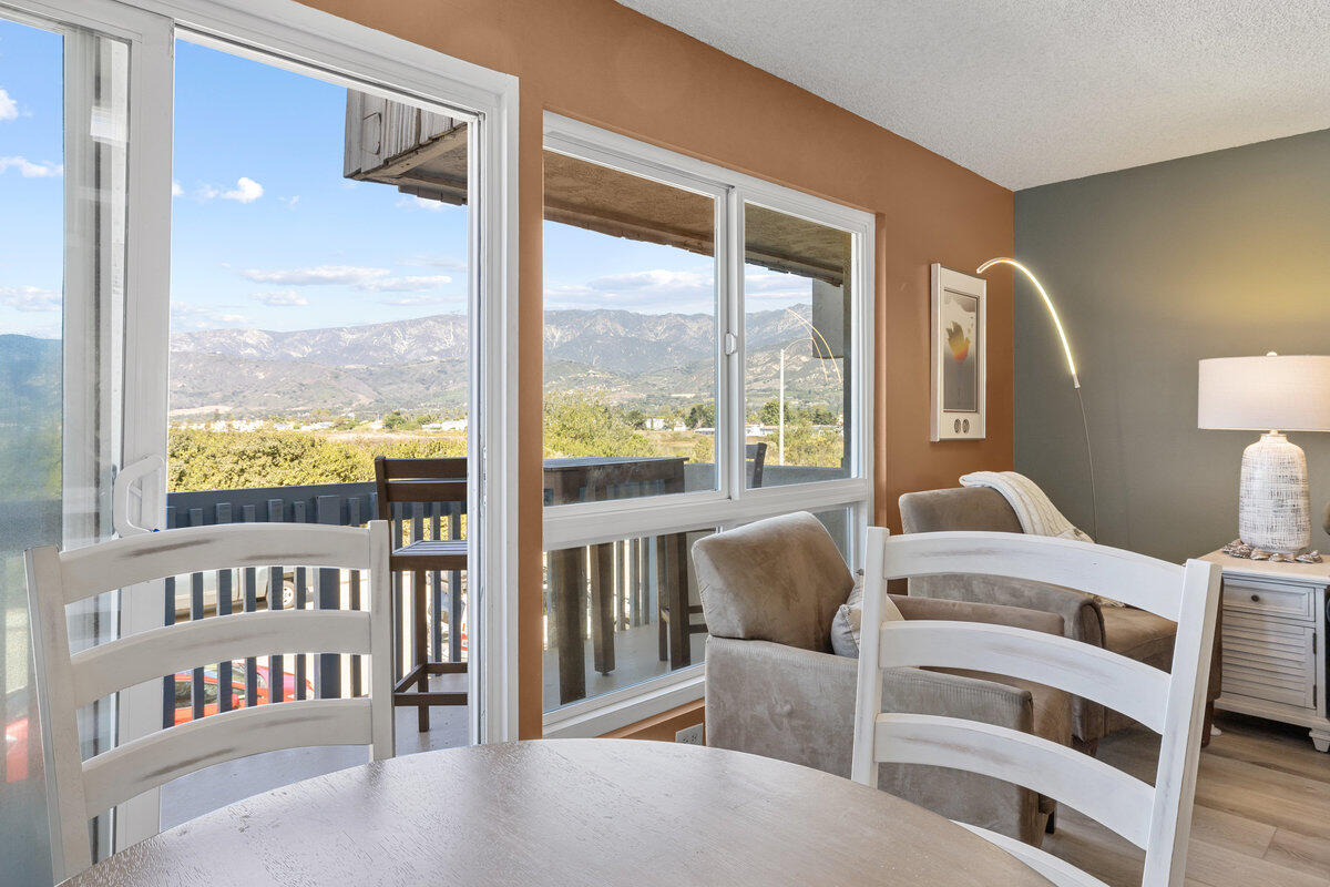4700 Sandyland Road, Unit 23 Carpinteria, CA 93013 - Photo 13 of 26 a living room with furniture and a large window