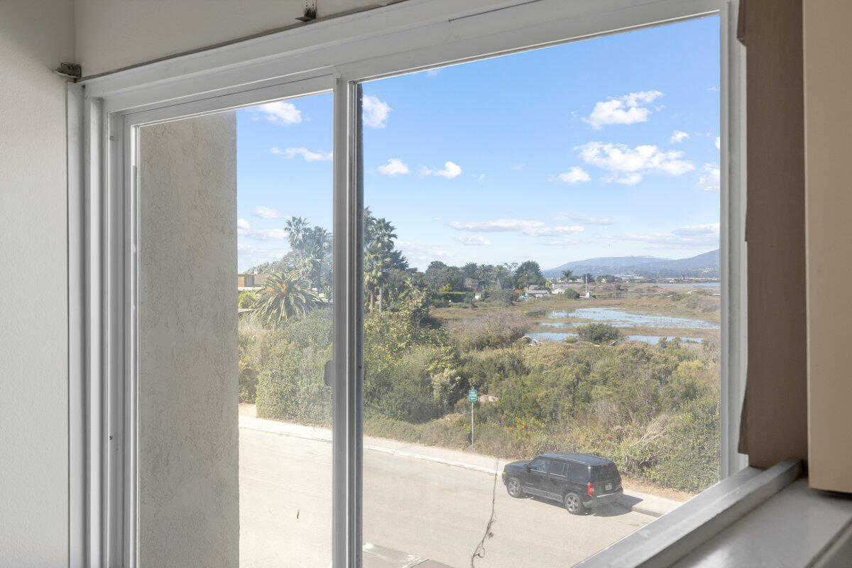 4700 Sandyland Road, Unit 23 Carpinteria, CA 93013 - Photo 19 of 26 a view of a glass door and a window
