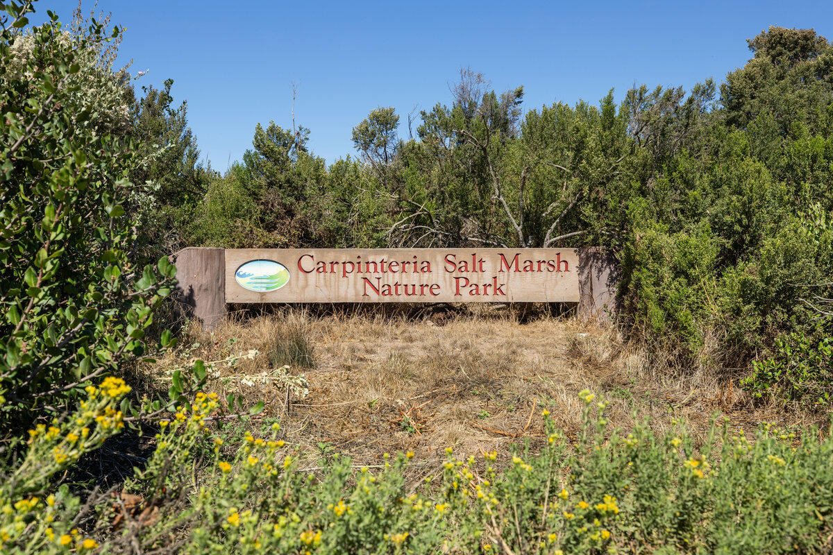 4700 Sandyland Road, Unit 23 Carpinteria, CA 93013 - Photo 24 of 26 a sign board with tall trees