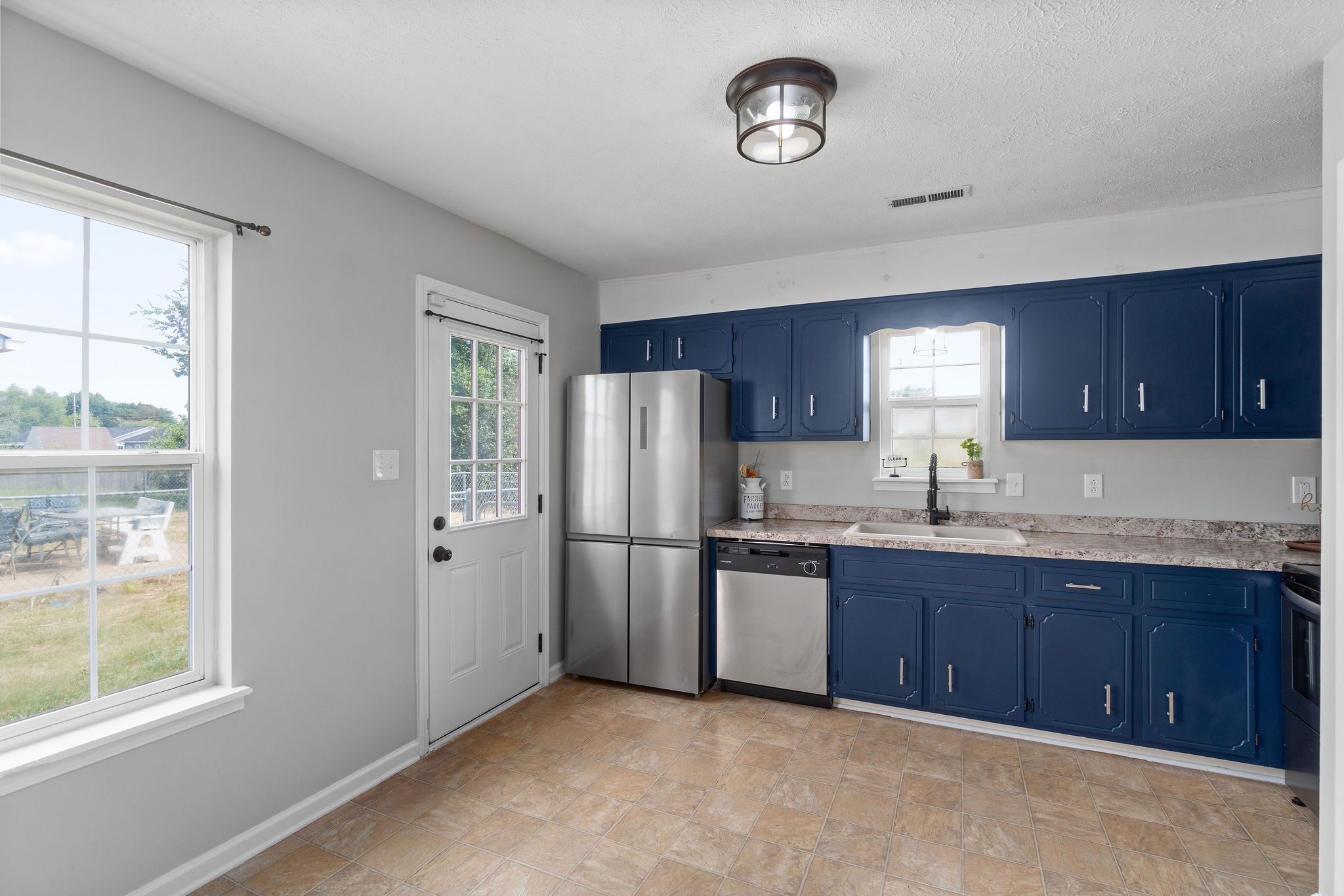 963 State Line Road Oak Grove, KY 42262 - Photo 16 of 33 a kitchen with refrigerator and window