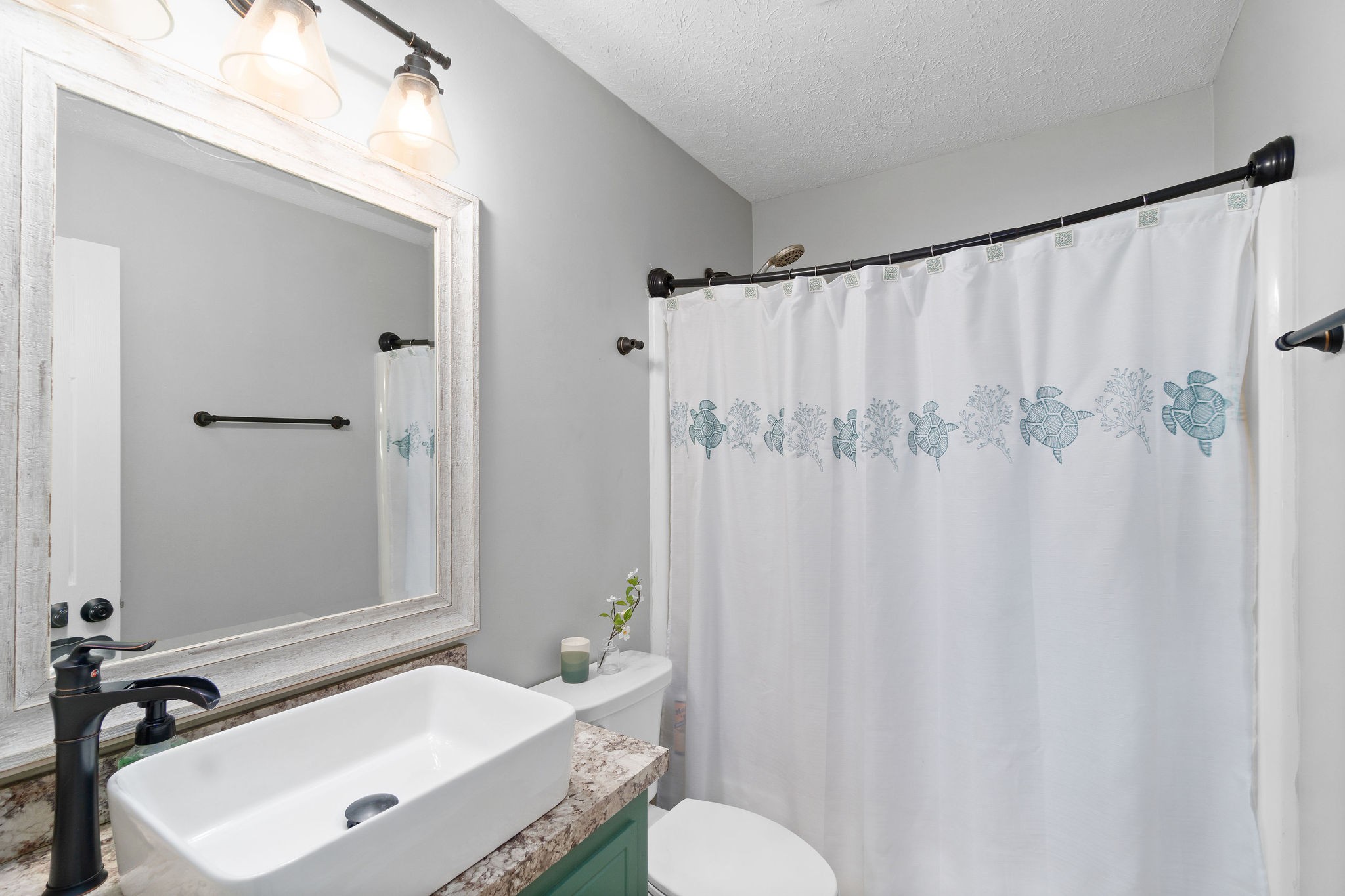 963 State Line Road Oak Grove, KY 42262 - Photo 19 of 33 a bathroom with a sink and a mirror
