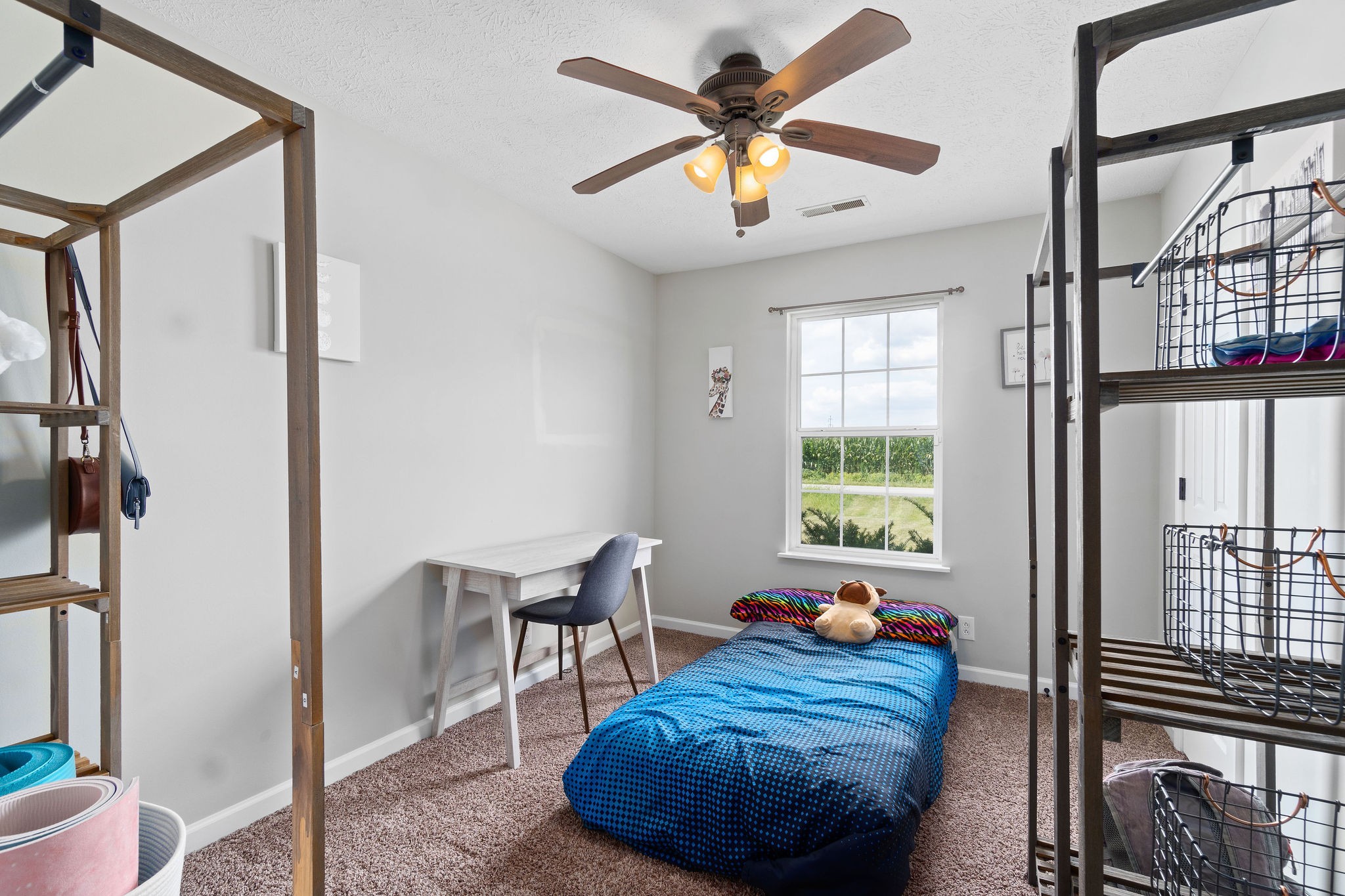 963 State Line Road Oak Grove, KY 42262 - Photo 21 of 33 a bed room with a bed and a chandelier