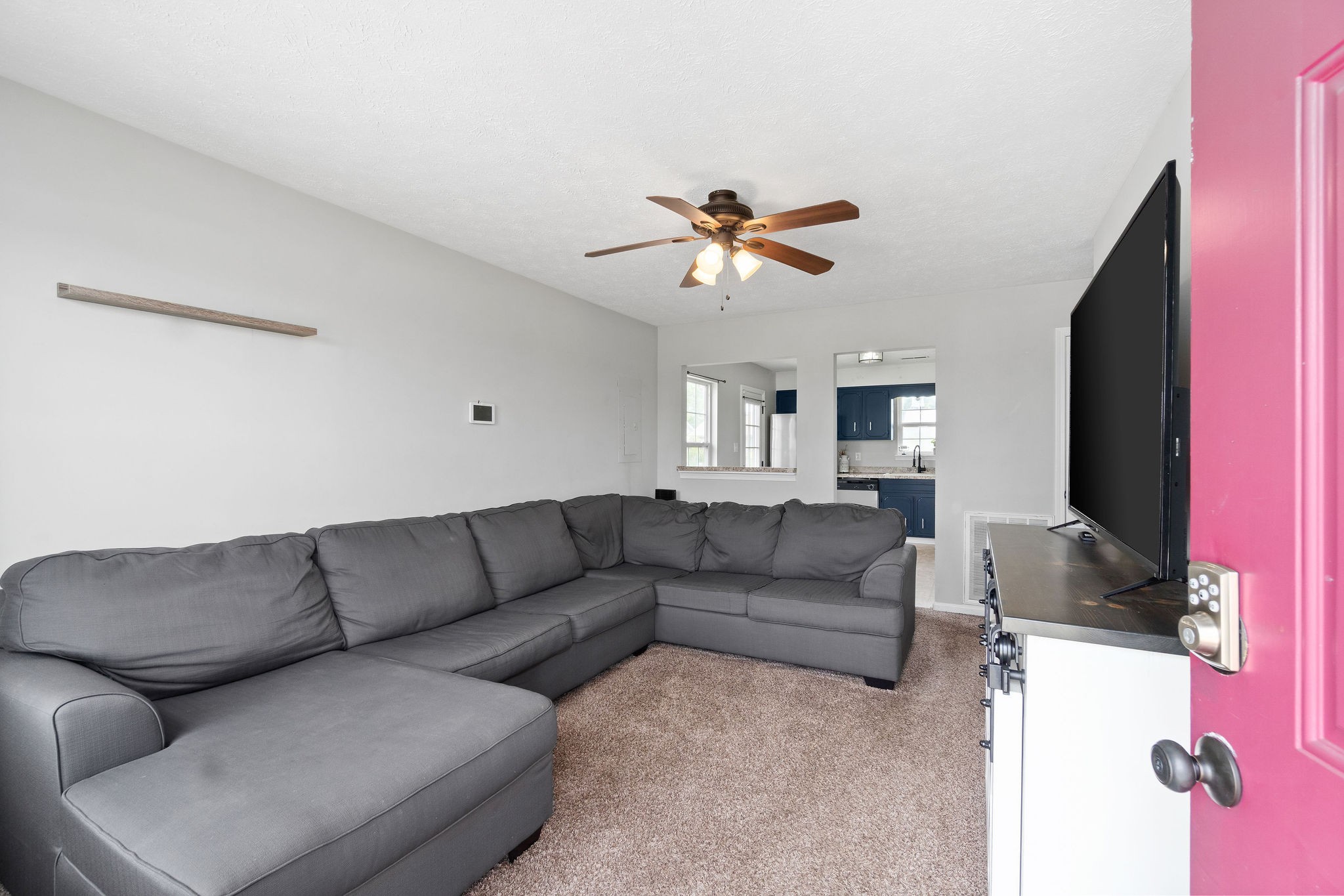 963 State Line Road Oak Grove, KY 42262 - Photo 5 of 33 a living room with furniture and a flat screen tv