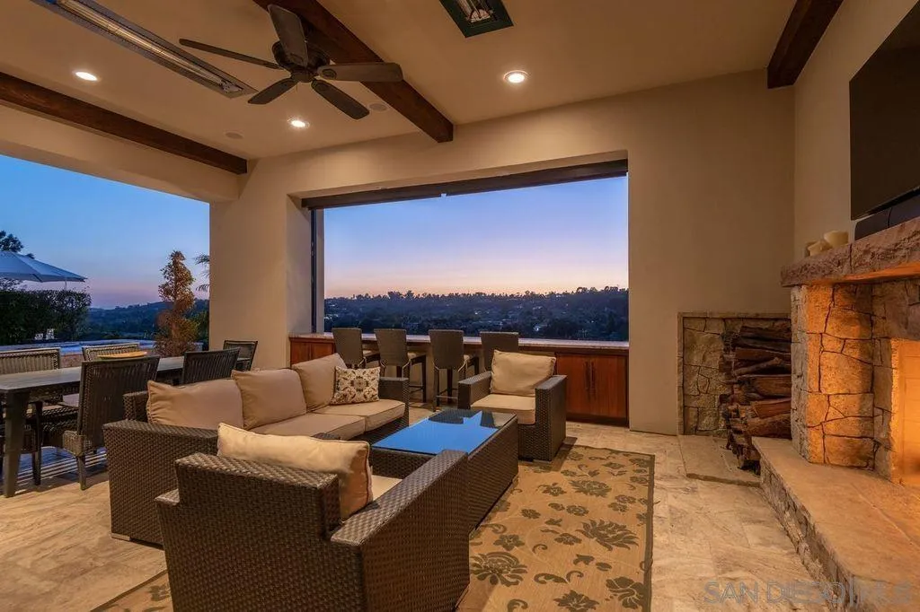 3023 Paseo Cielo Rancho Santa Fe, CA 92067 - Photo 17 of 33 a living room with furniture and a flat screen tv