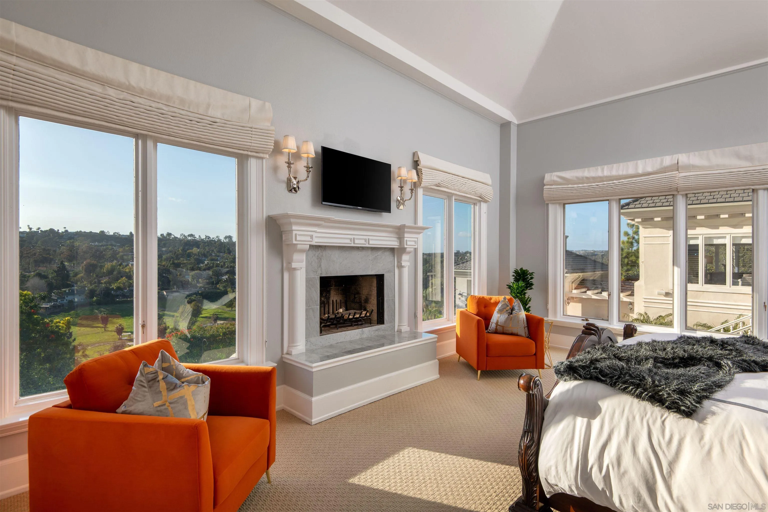 3023 Paseo Cielo Rancho Santa Fe, CA 92067 - Photo 21 of 33 a living room with furniture and a fireplace
