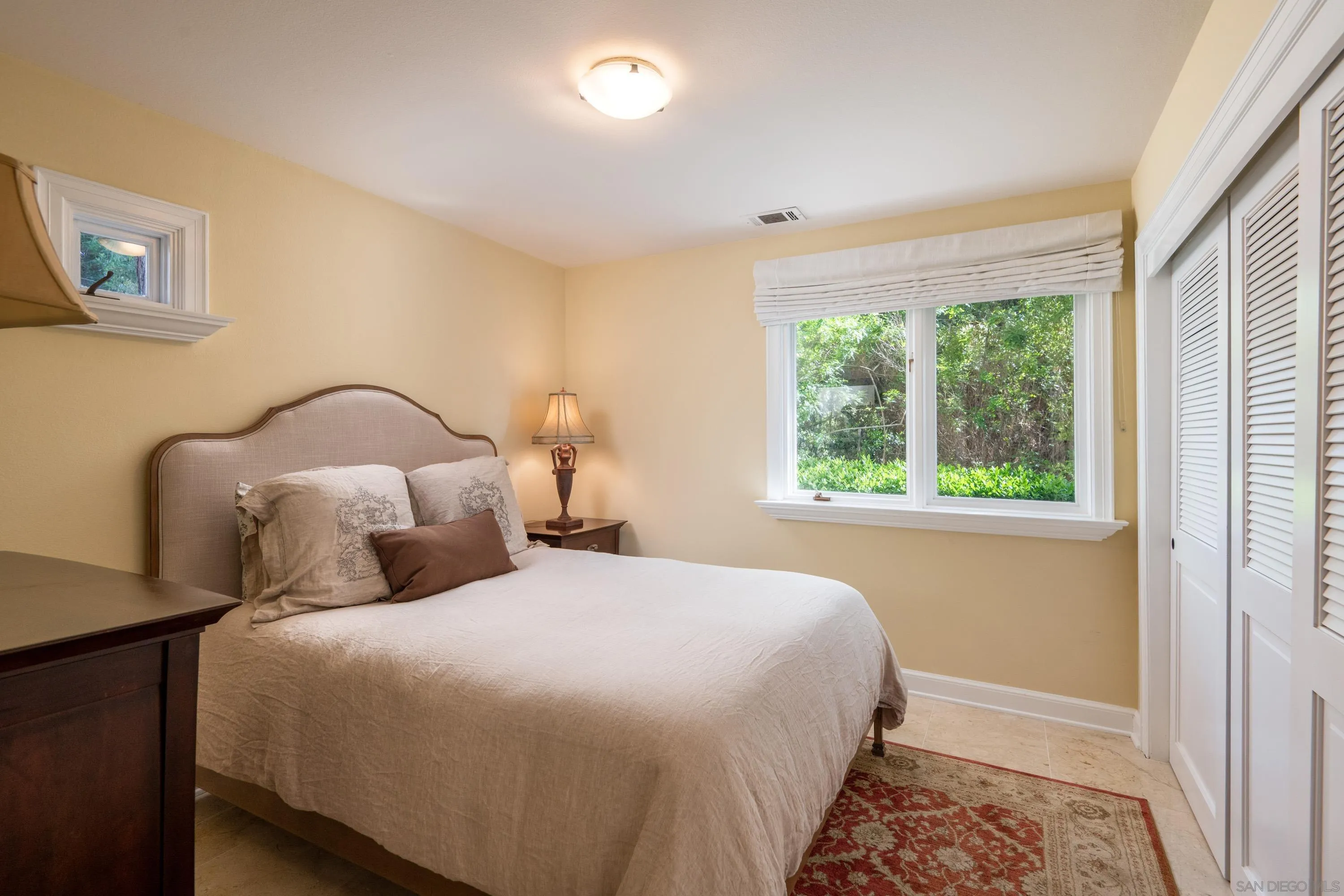 3023 Paseo Cielo Rancho Santa Fe, CA 92067 - Photo 29 of 33 a bedroom with bed and a window