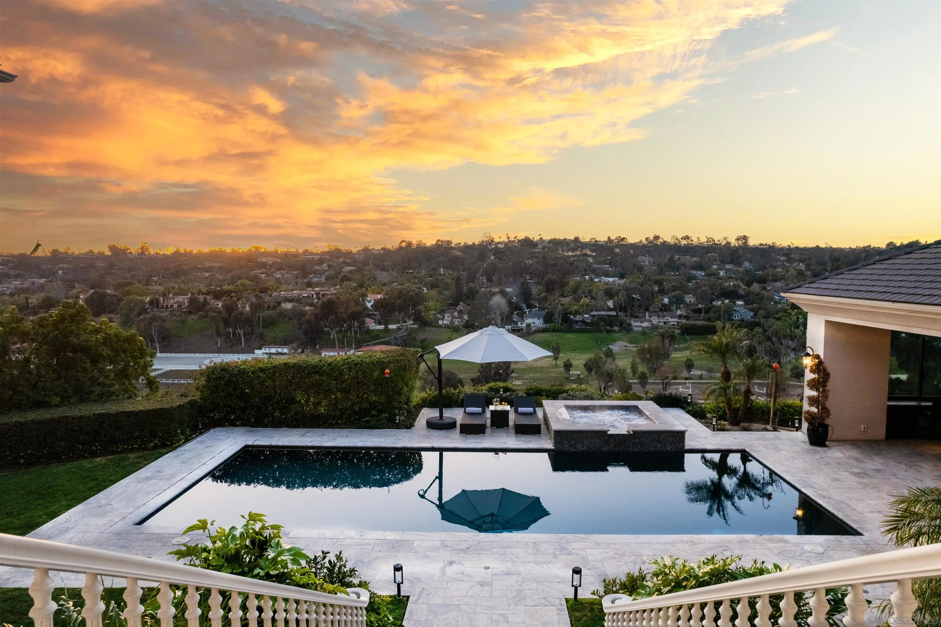 3023 Paseo Cielo Rancho Santa Fe, CA 92067 - Photo 4 of 33 a view of swimming pool with outdoor seating and plants