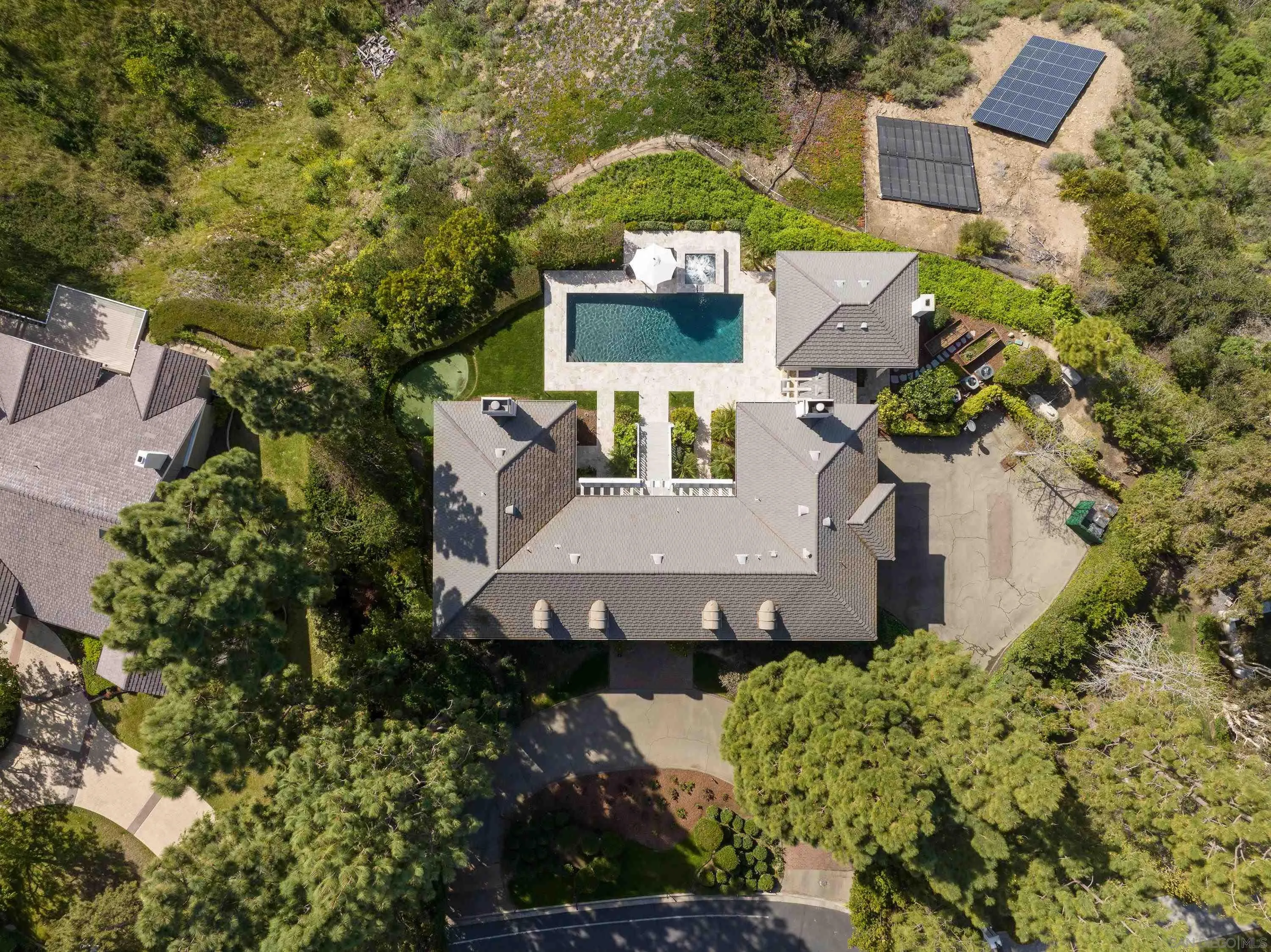 3023 Paseo Cielo Rancho Santa Fe, CA 92067 - Photo 9 of 33 an aerial view of a house with a garden