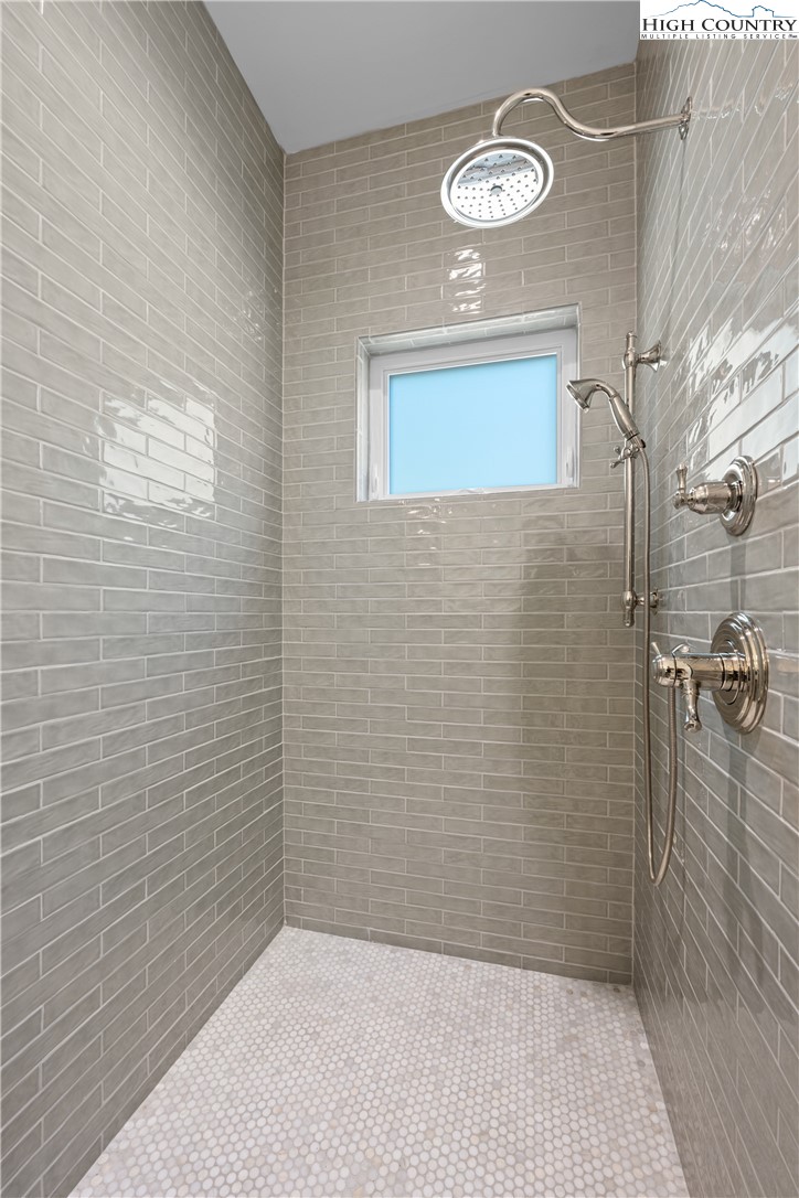 2181 Broadstone Road Banner Elk, NC 28604 - Photo 24 of 38 a bathroom with a shower