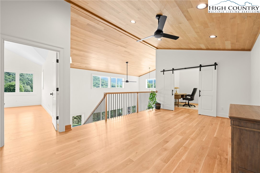 2181 Broadstone Road Banner Elk, NC 28604 - Photo 25 of 38 a view of a livingroom with furniture and a window