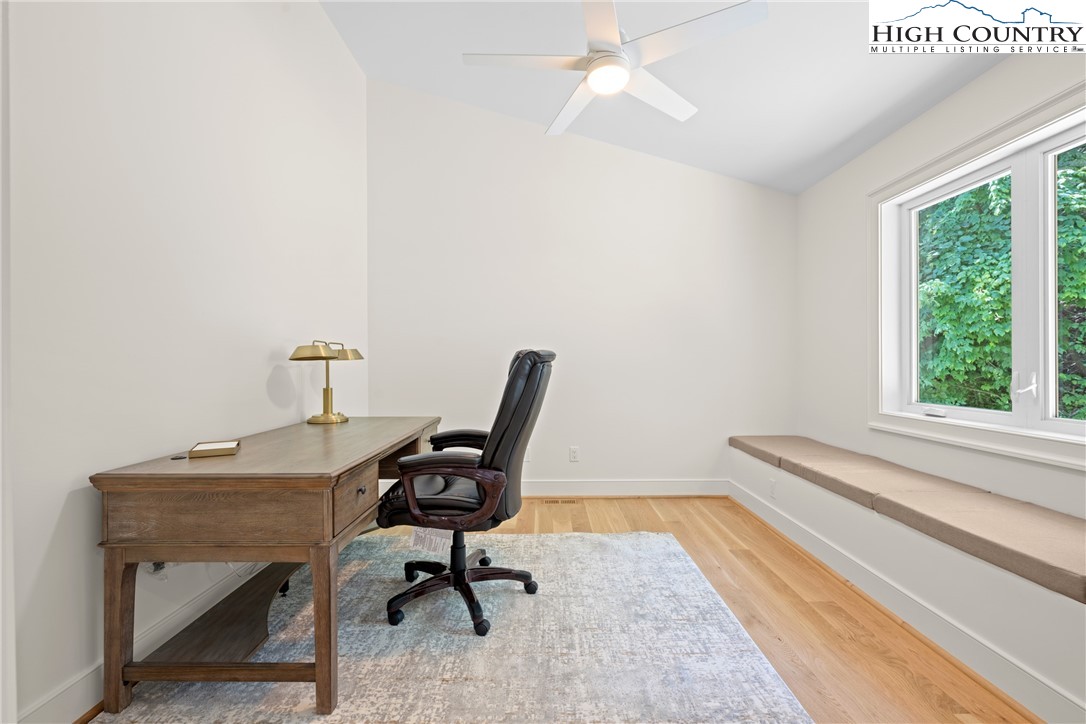 2181 Broadstone Road Banner Elk, NC 28604 - Photo 27 of 38 a view of a workspace with furniture and a window