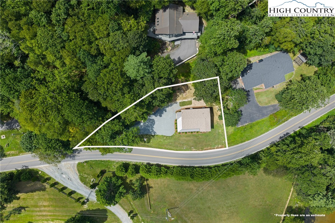 2181 Broadstone Road Banner Elk, NC 28604 - Photo 36 of 38 an aerial view of a house with a yard