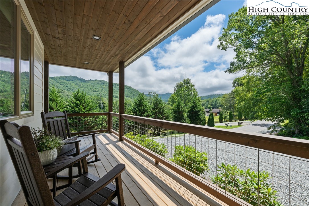 2181 Broadstone Road Banner Elk, NC 28604 - Photo 4 of 38 a view of balcony with wooden floor