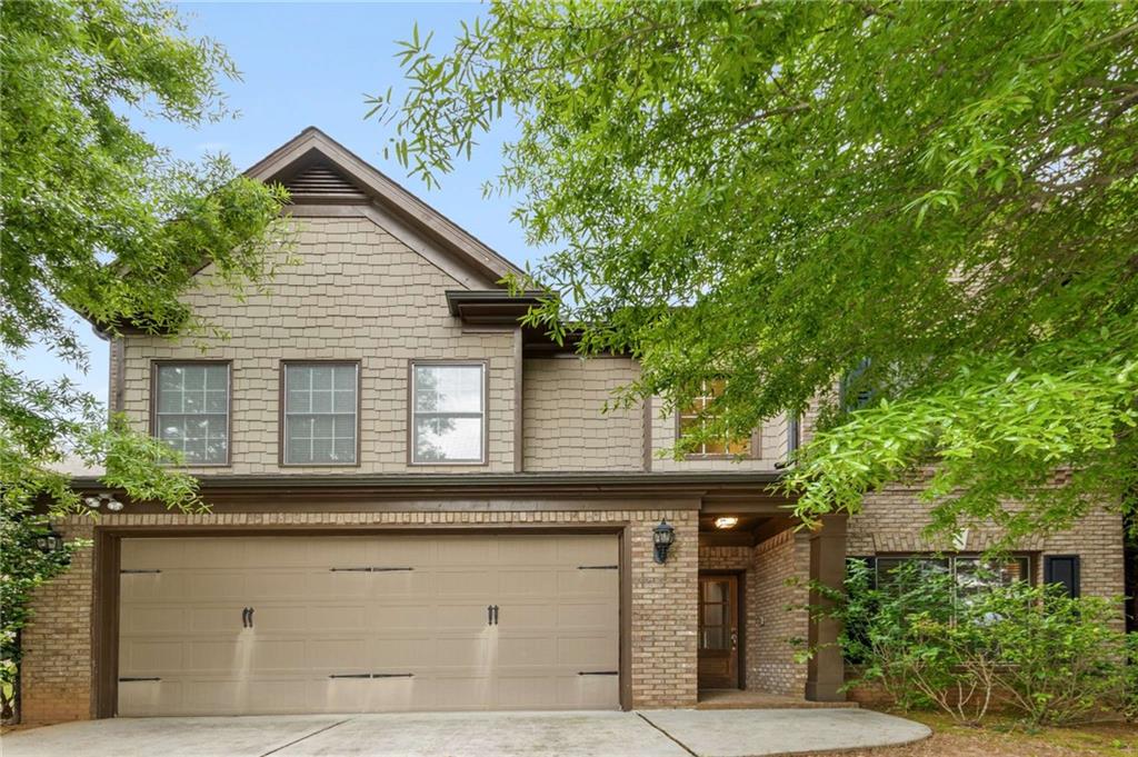 3051 Frazier Walk Decatur, GA 30033 - Photo 1 of 1 a front view of a house with a garden