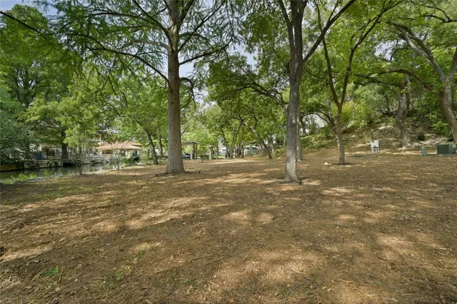 an outdoor space with patio furniture and potted plants