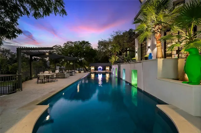 a view of a lake with sitting area