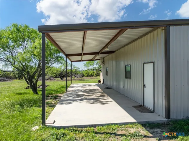 a view of a backyard with a garden
