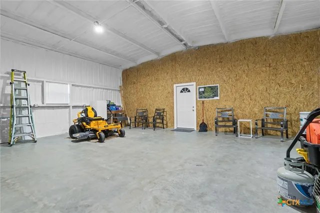 a view of a big room with gym equipment