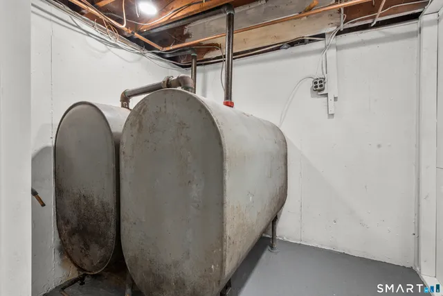 a view of a room with wooden walls