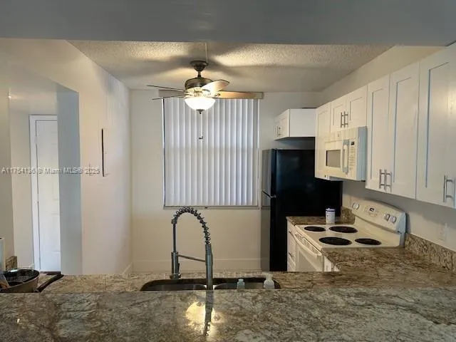 $290,000 | 1524 Whitehall Drive, Unit 102, Davie, FL 33324