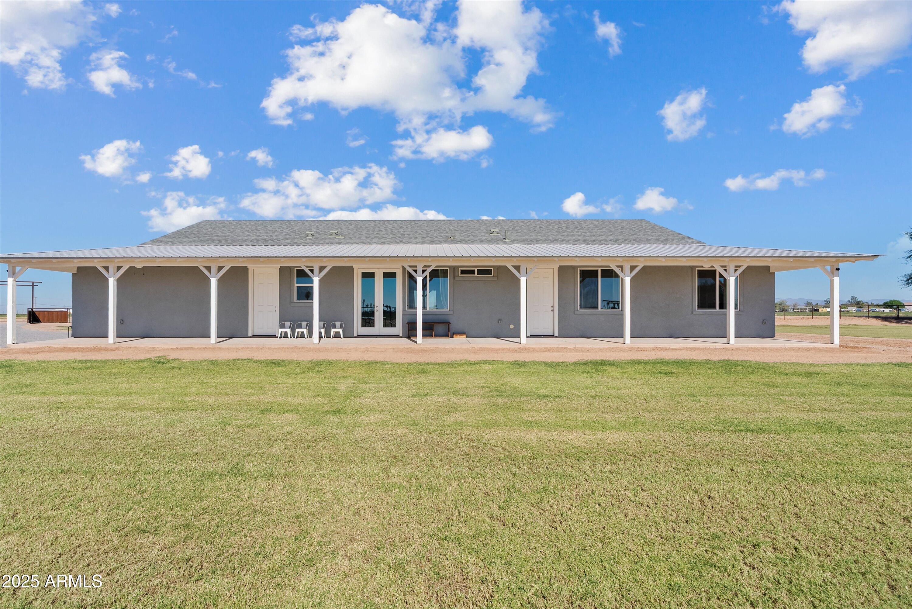 10473 East Dixie Road Florence, AZ 85132 - Photo 5 of 42 a view of a house with a backyard
