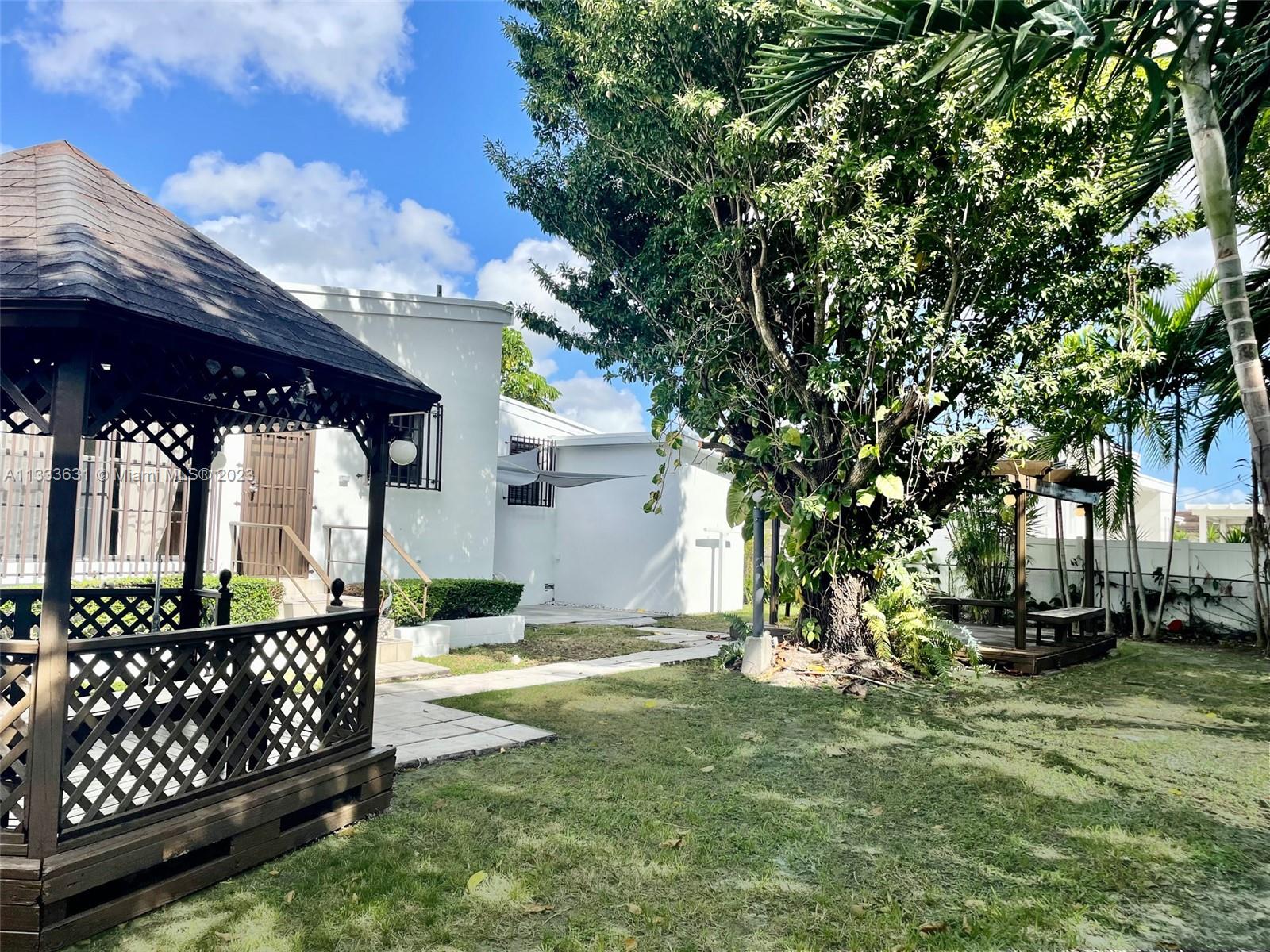 8600 Southwest 33rd Terrace Miami, FL 33155 - Photo 14 of 14 a view of a house with a yard
