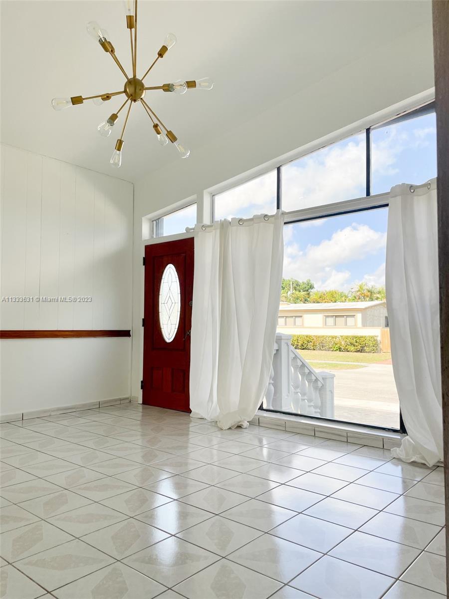8600 Southwest 33rd Terrace Miami, FL 33155 - Photo 3 of 14 a view of a room with furniture and a window