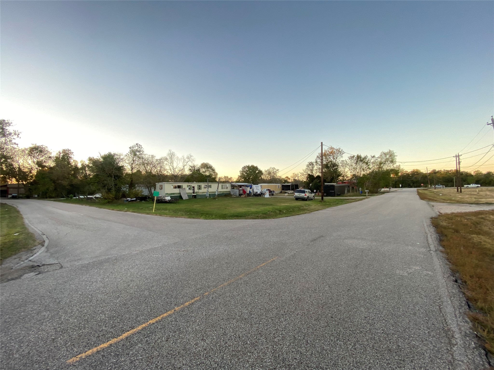 16118 County Road 897 Rosharon, TX 77583 - Photo 3 of 12 a view of a road with a yard