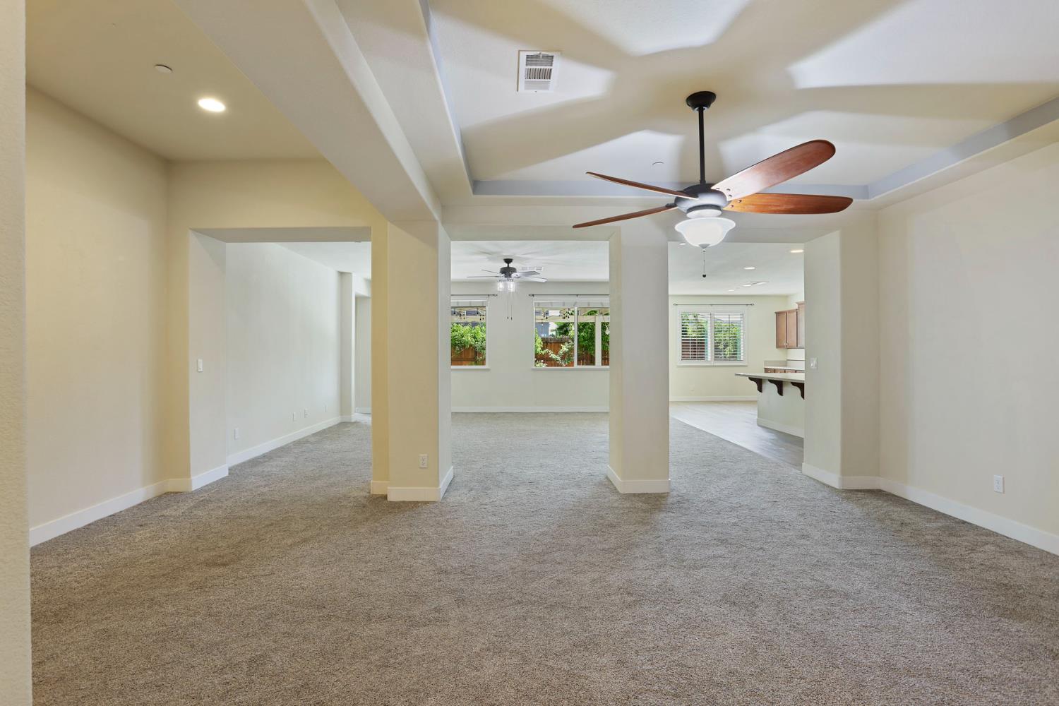 2364 Inyo Place Manteca, CA 95337 - Photo 14 of 69 a view of a livingroom with a ceiling fan and window