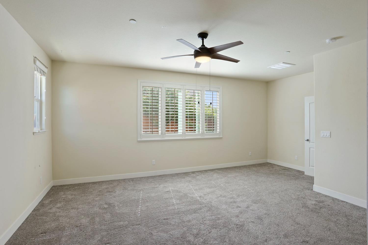 2364 Inyo Place Manteca, CA 95337 - Photo 18 of 69 a view of an empty room with a window