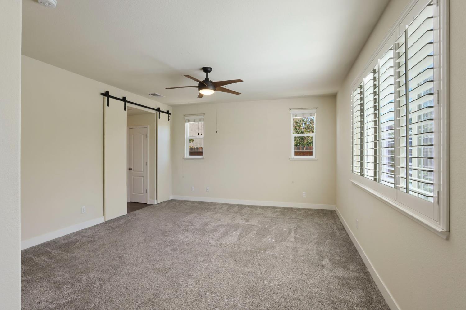 2364 Inyo Place Manteca, CA 95337 - Photo 19 of 69 a view of an empty room with a window