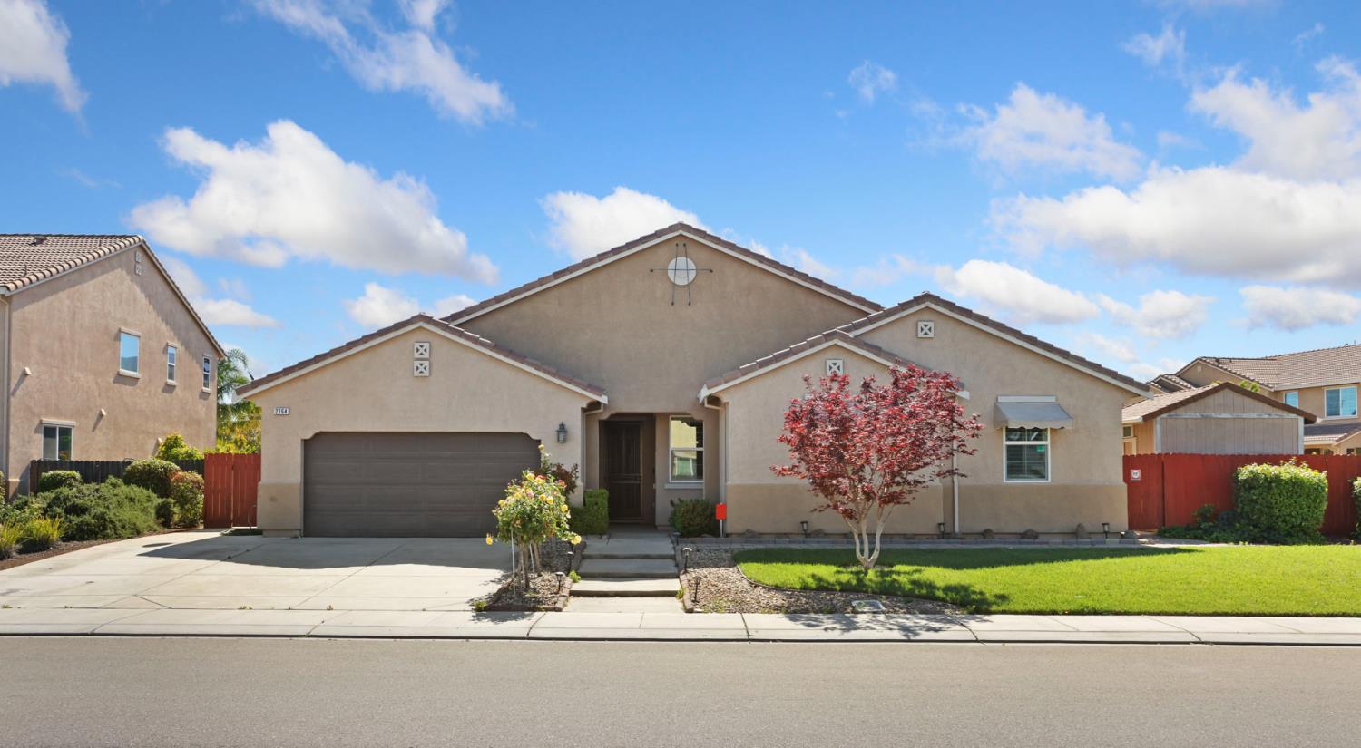 2364 Inyo Place Manteca, CA 95337 - Photo 2 of 69 a front view of house with garage and yard