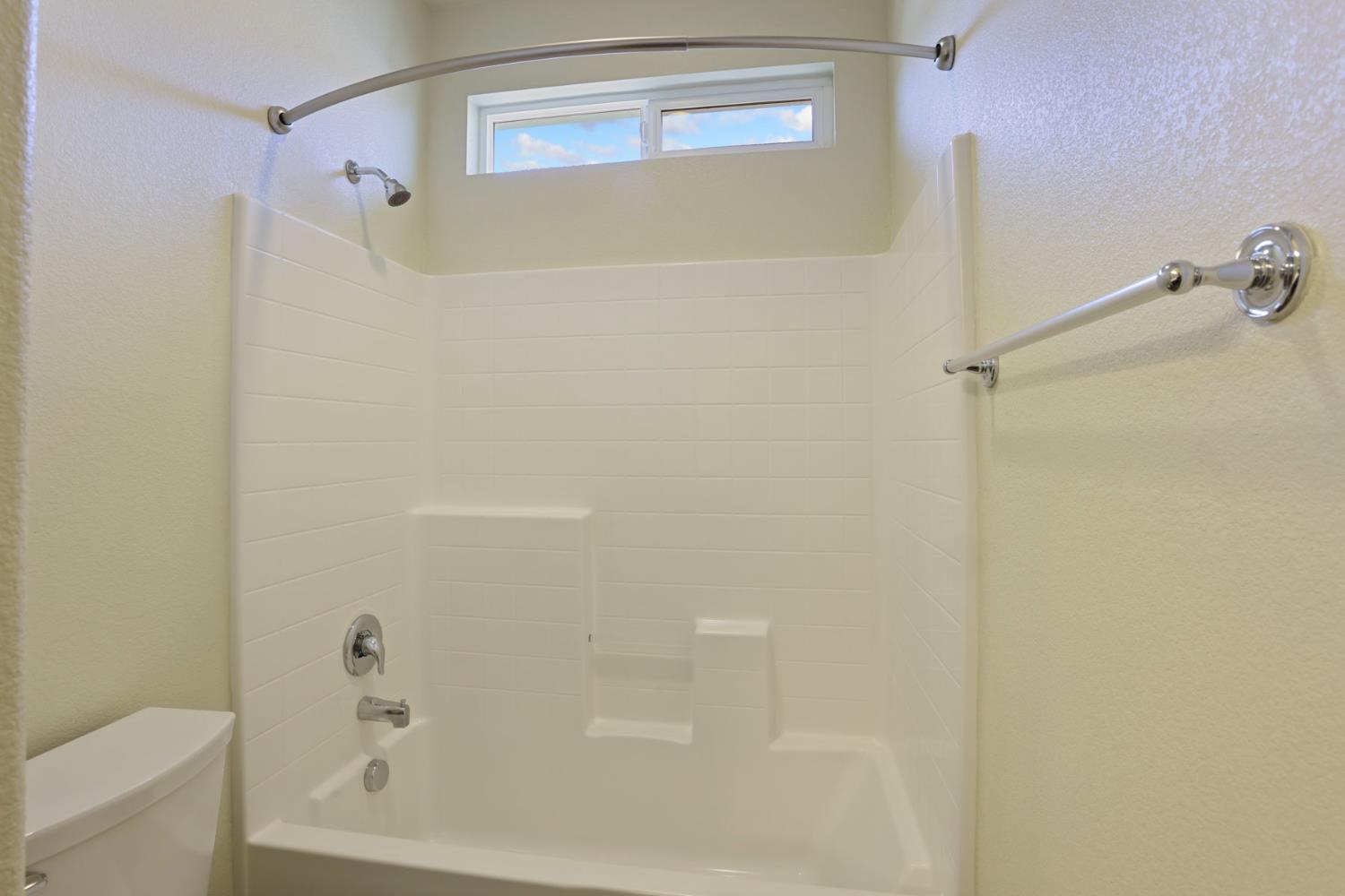 2364 Inyo Place Manteca, CA 95337 - Photo 40 of 69 a bathroom with a bathtub