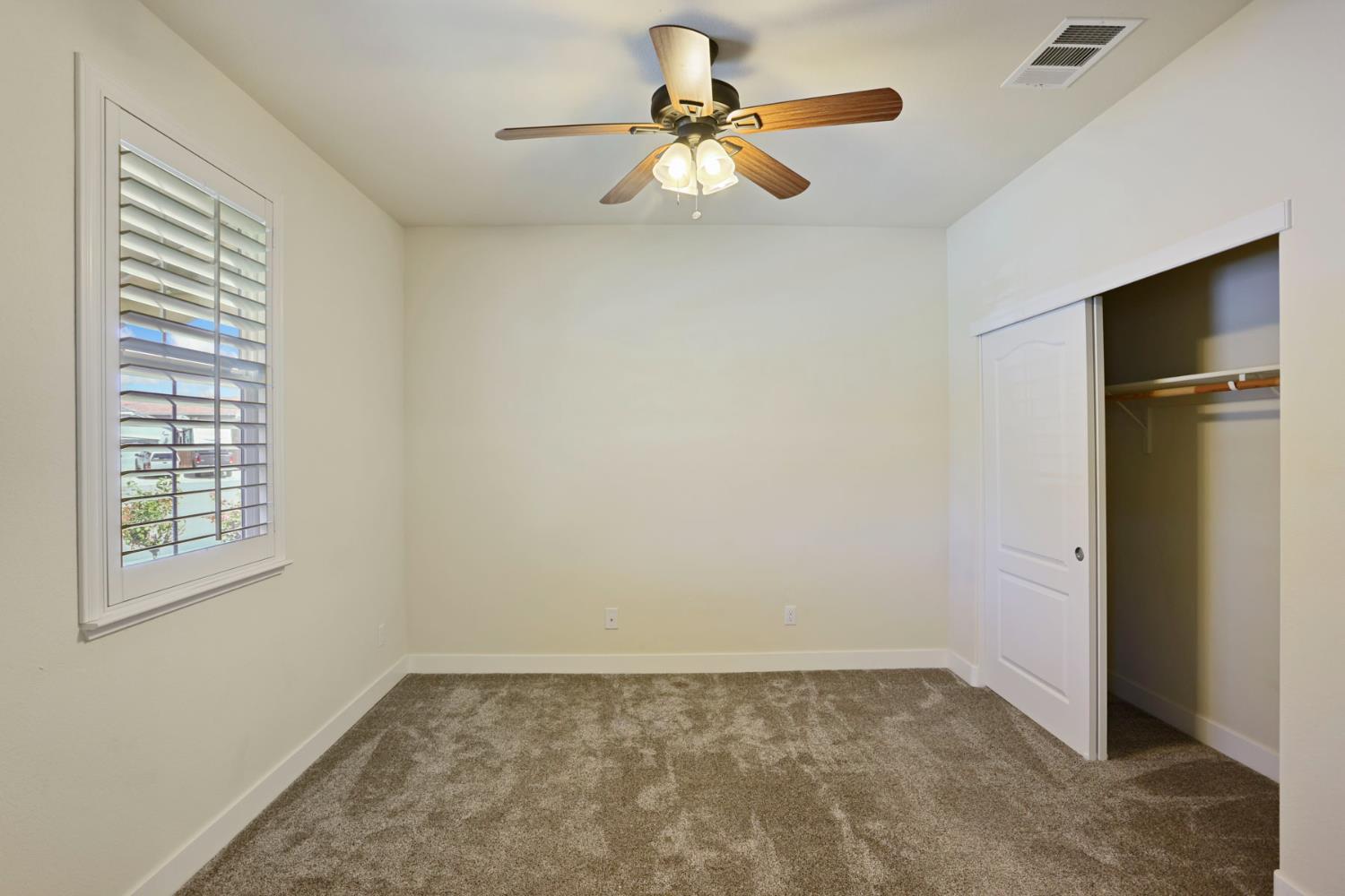 2364 Inyo Place Manteca, CA 95337 - Photo 41 of 69 a view of an empty room with a window