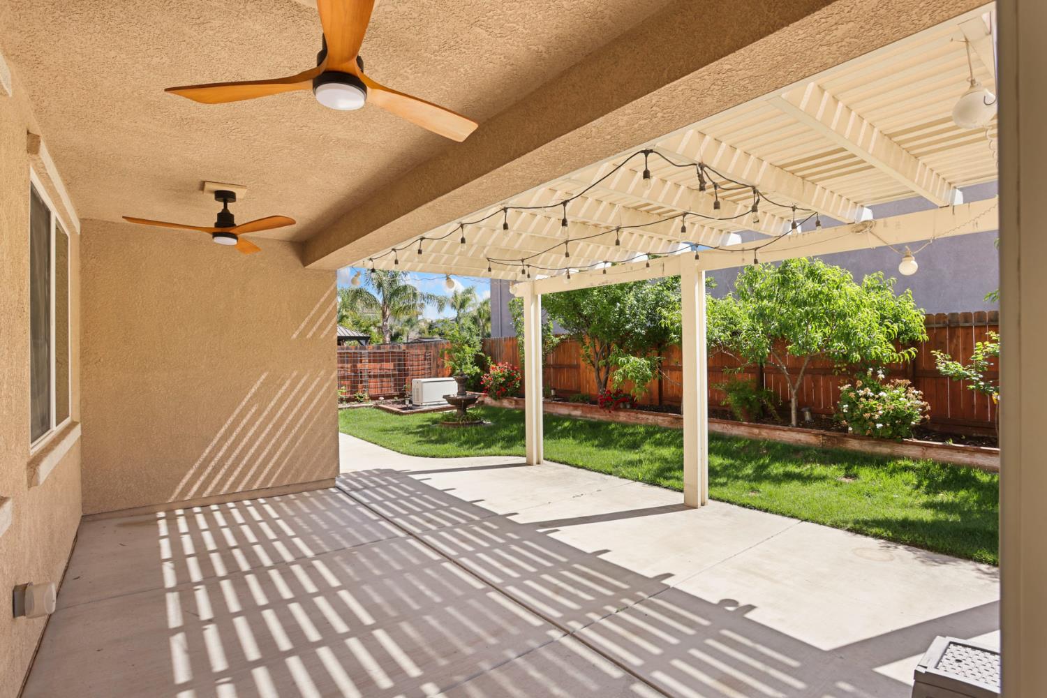 2364 Inyo Place Manteca, CA 95337 - Photo 47 of 69 a view of a patio with a table and chairs