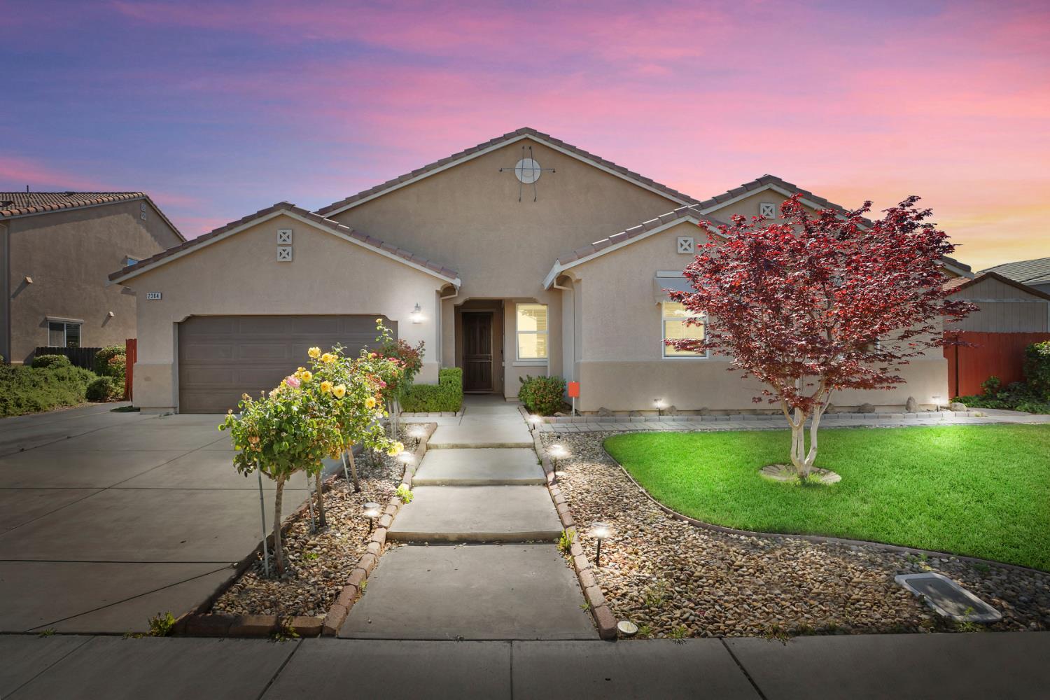 2364 Inyo Place Manteca, CA 95337 - Photo 5 of 69 a front view of a house with garden